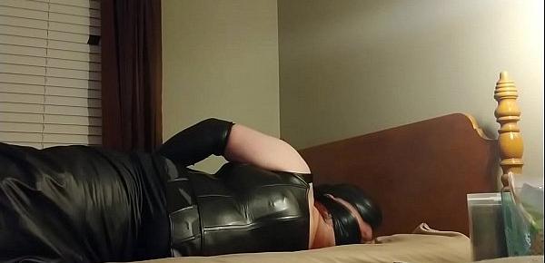  wakeing up in leather and bondage crossdresser